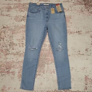 Levi's 721 High Rise Light wash Distressed Skinny Jeans - 32